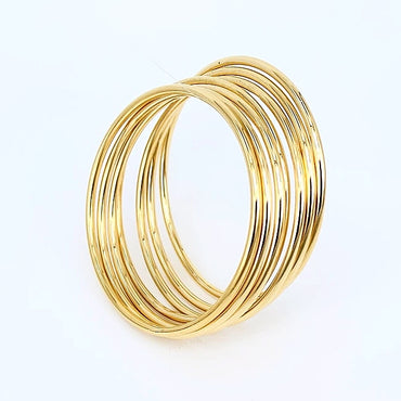 7 piece yellow gold plated bangle set.