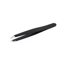 Black metal tweezers. Part of 5 piece cosmetic tools set. 