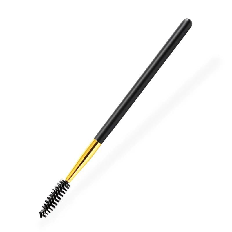 Black spoolie brush with gold metal detail. Part of 5 piece cosmetic tools set. 