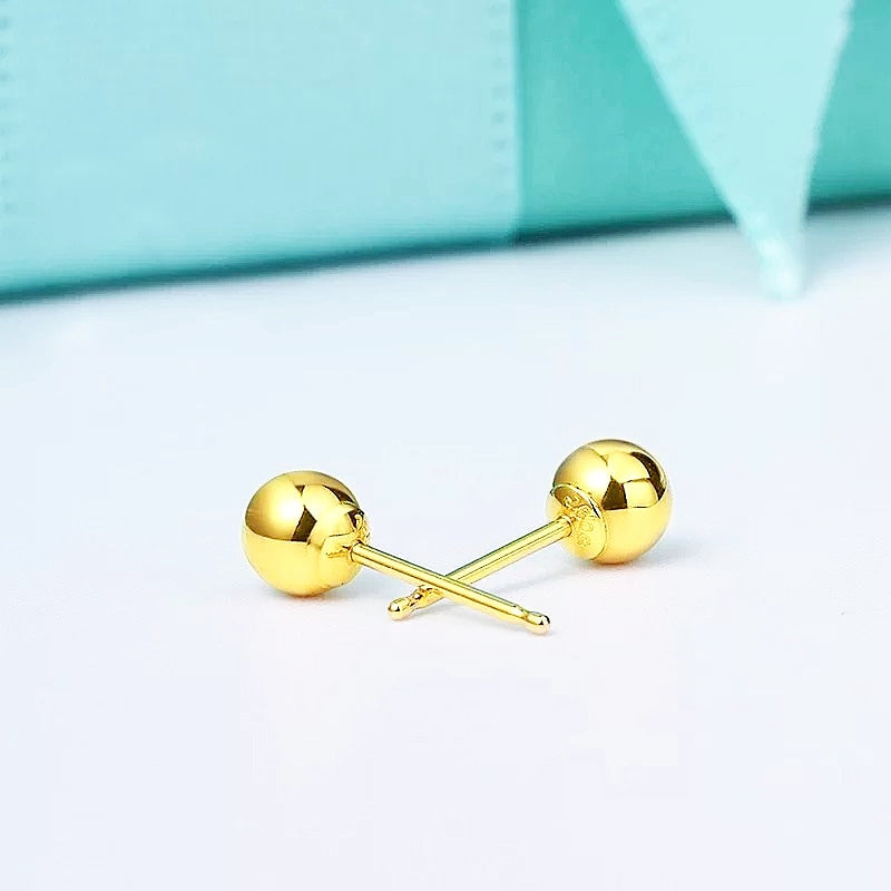 Small-medium, yellow gold plated, ball stud earrings.