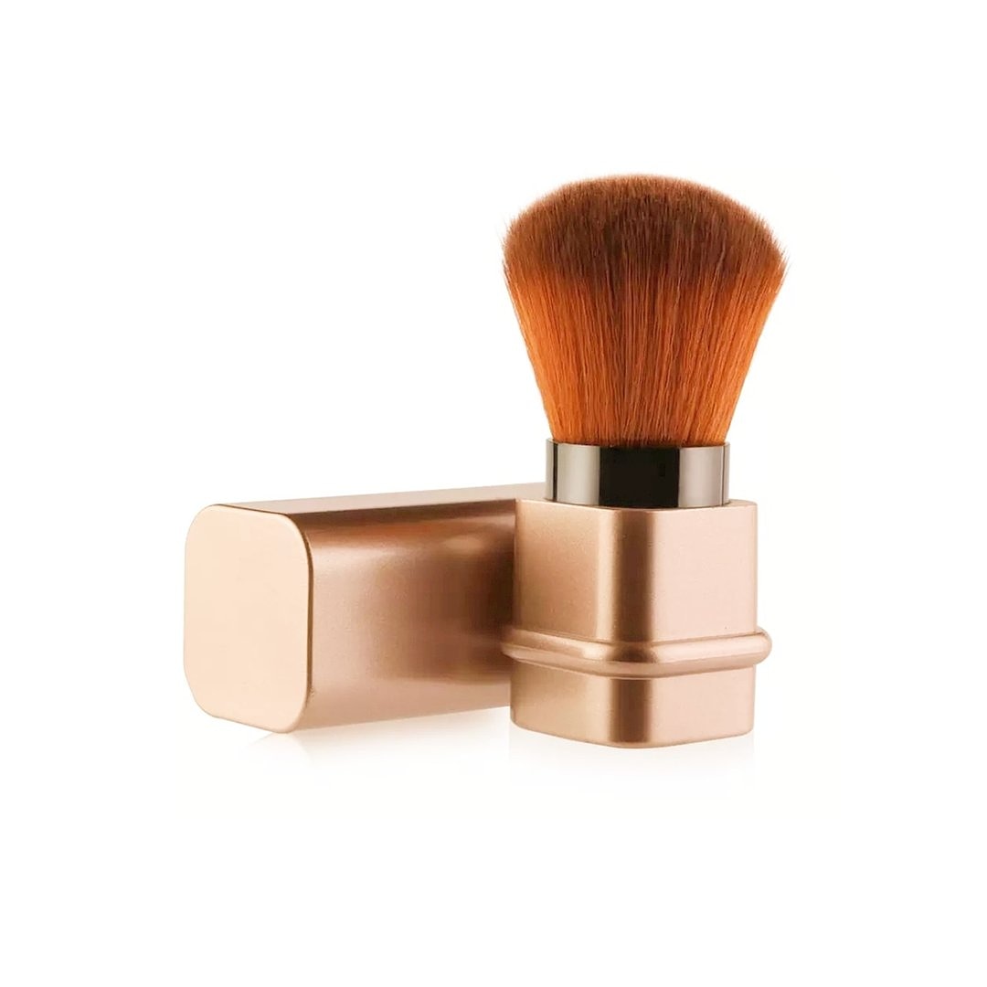 Gold retractable multipurpose makeup brush with matching gold cap. Travel makeup brush.